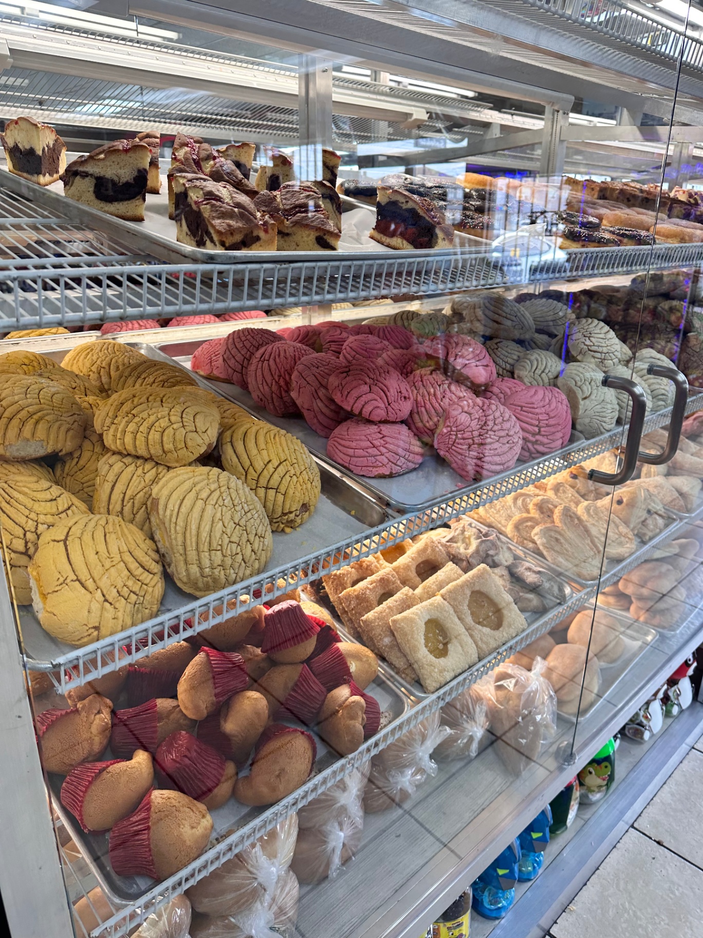 Fresh Mexican pan dulce in the Los Amigos panadería case