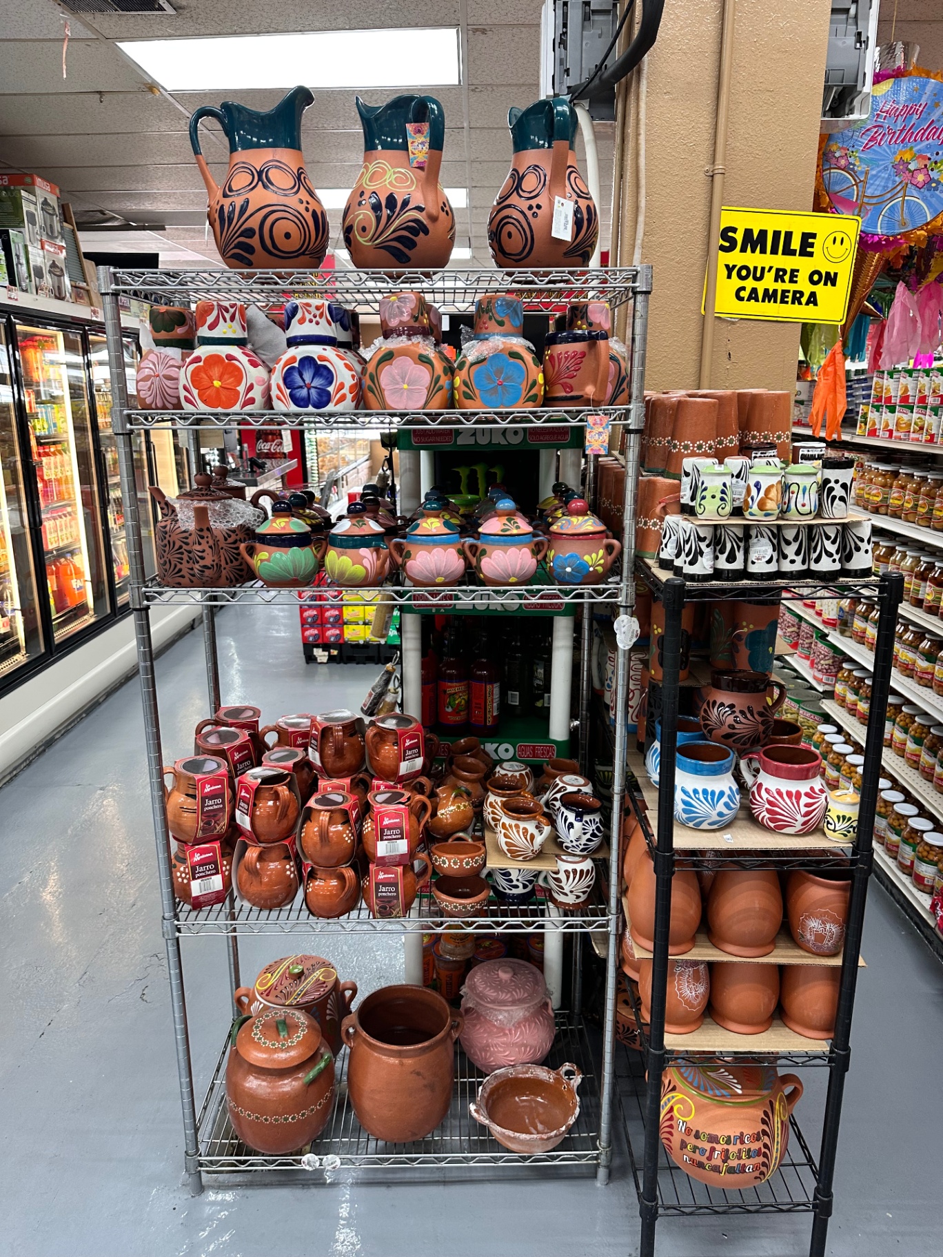Hand-painted Mexican talavera pottery, jarros, and clay cookware